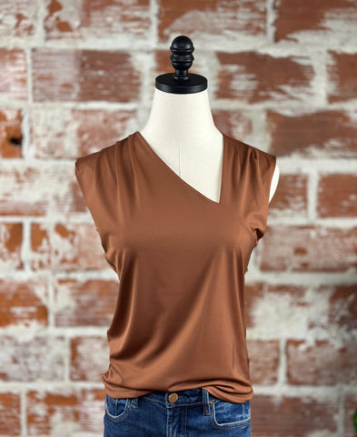 Asymmetrical Top in Clay